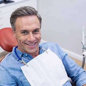 Older man at periodontist’s office sitting in chair