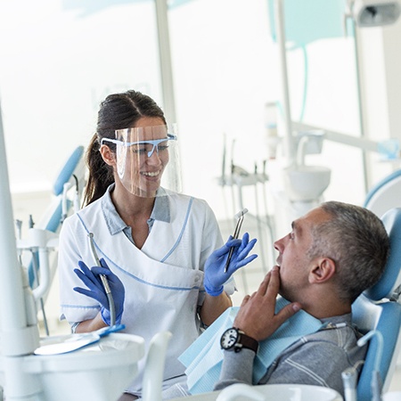 Dentist explaining treatment to patient